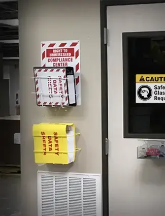 SDS binder and compliance material displayed for workers