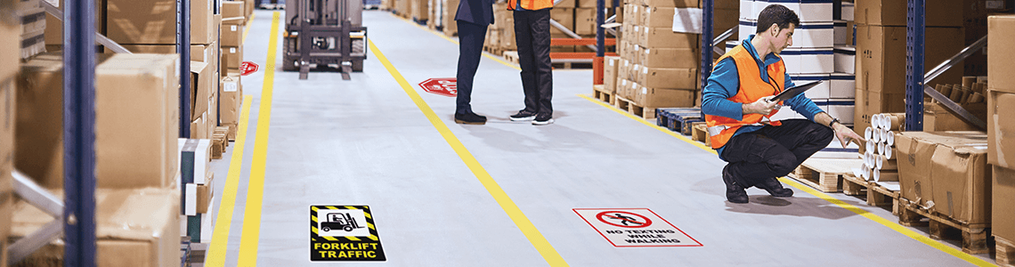 Warehouse with appropriate floor marking floor tape.