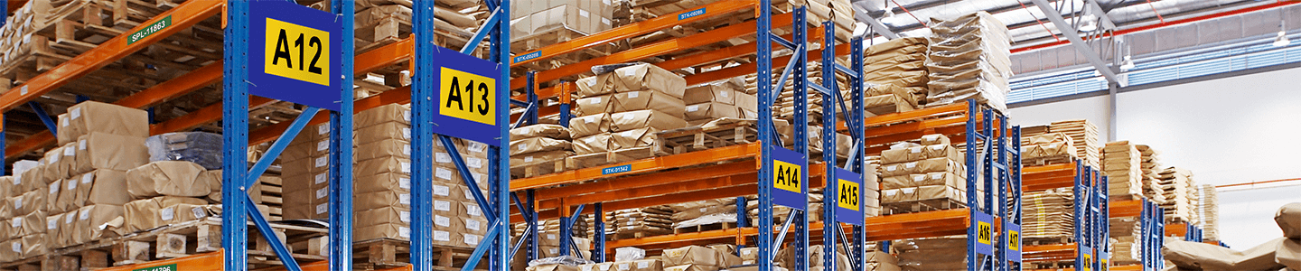 5S labeling and organization techniques are shown in on warehouse shelving.