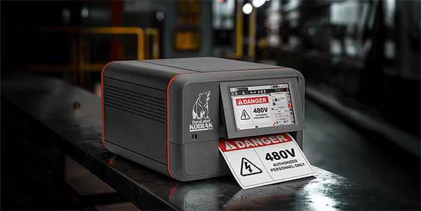 A DuraLabel Kodiak Max Printer printing out a DANGER sign to highlight electrical hazards.