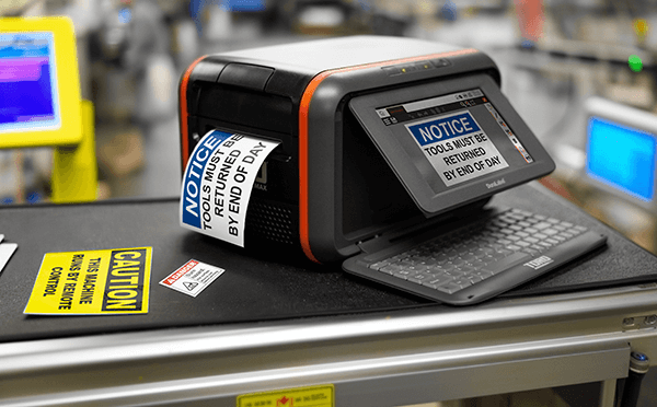 DuraLabel Toro Max Industrial Sign and Label System producing custom safety signs for workplace use.