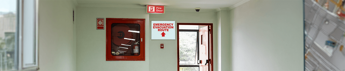 Emergency exit signage directing safe exits