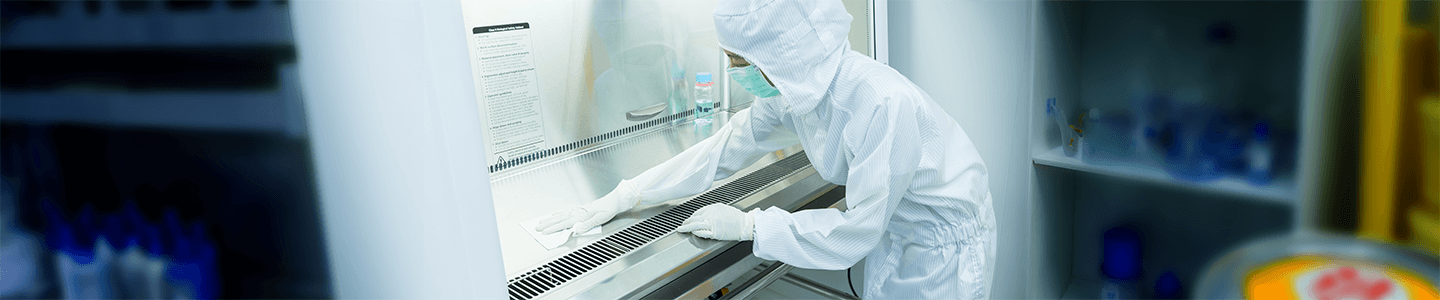 Lab workers washing their hands.