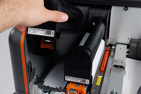 The Kodiak Max Thermal Transfer Printer quick-load cartridge being loaded.