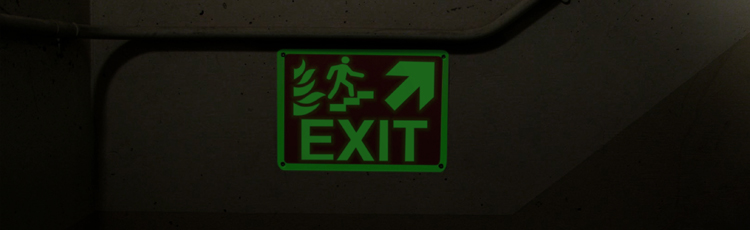 A glow-in-the-dark fire exit sign 