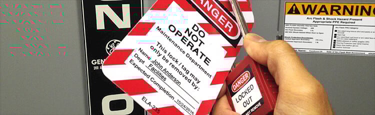 Lockout tagout signs on an electrical panel.