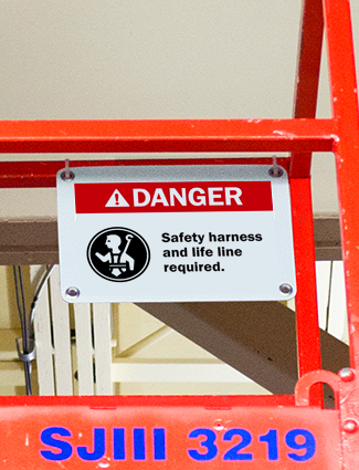 Danger sign remind workers to wear PPE