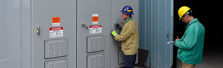 A worker implementing electrical safety to avoid arc flash