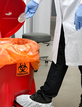 Labels mark biohazardous waste disposal
