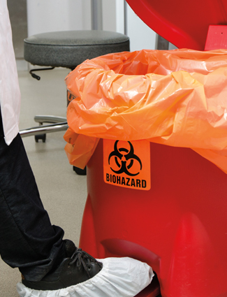red biohazard waste bag and container