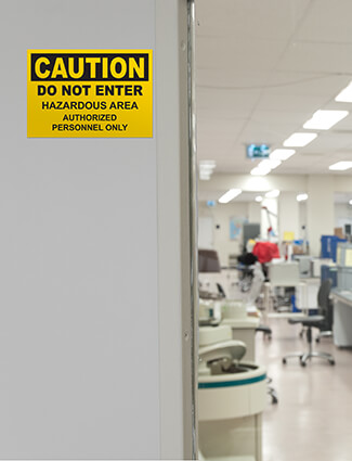 Signs communicate dangers in facilities.