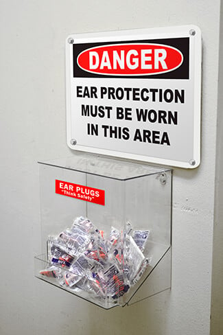 Ear protection safety sign in poultry processing facility