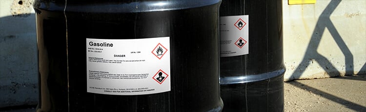 An oil drum marked with a HazCom compliant label - Gasoline