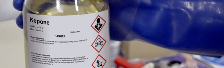 HazCom compliant label on a dangerous bottle of chemicals.