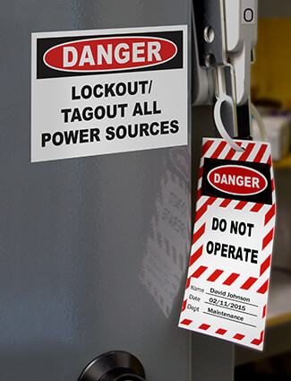 Lockout/tagout signs and labels on power box