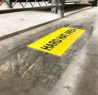 Overlaminate on warehouse floor marking