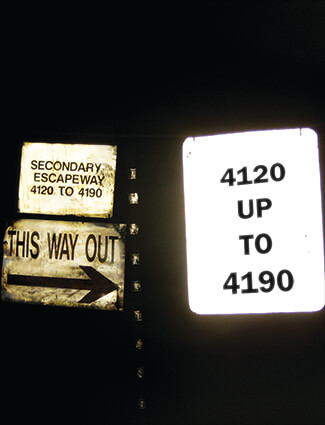Signs reflect safety information in mining