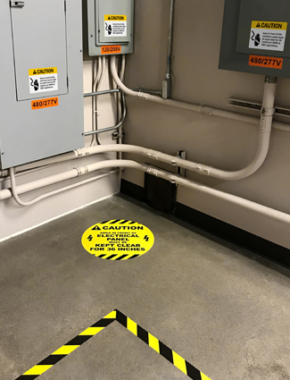 Communicate electrical hazards with signs, labels, and floor marking.