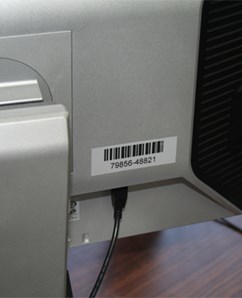 computer monitor with an asset barcode label
