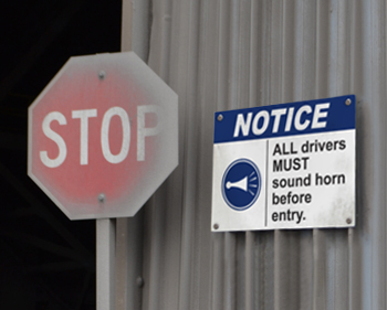Notice sign instructs drivers.