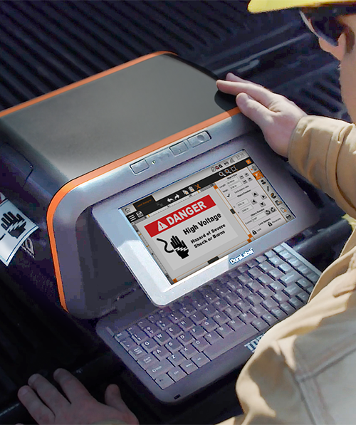 A worker using LabelForge PRO on a Toro Max to print a safety label.